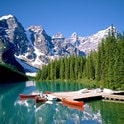 moraine lake with canoes