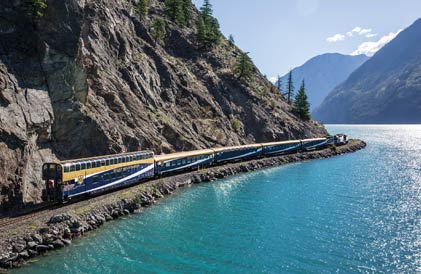 The Rocky Mountaineer train travelling by Seton Lake