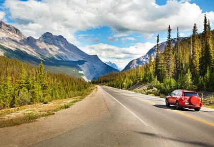 Car driving through Banff National Park